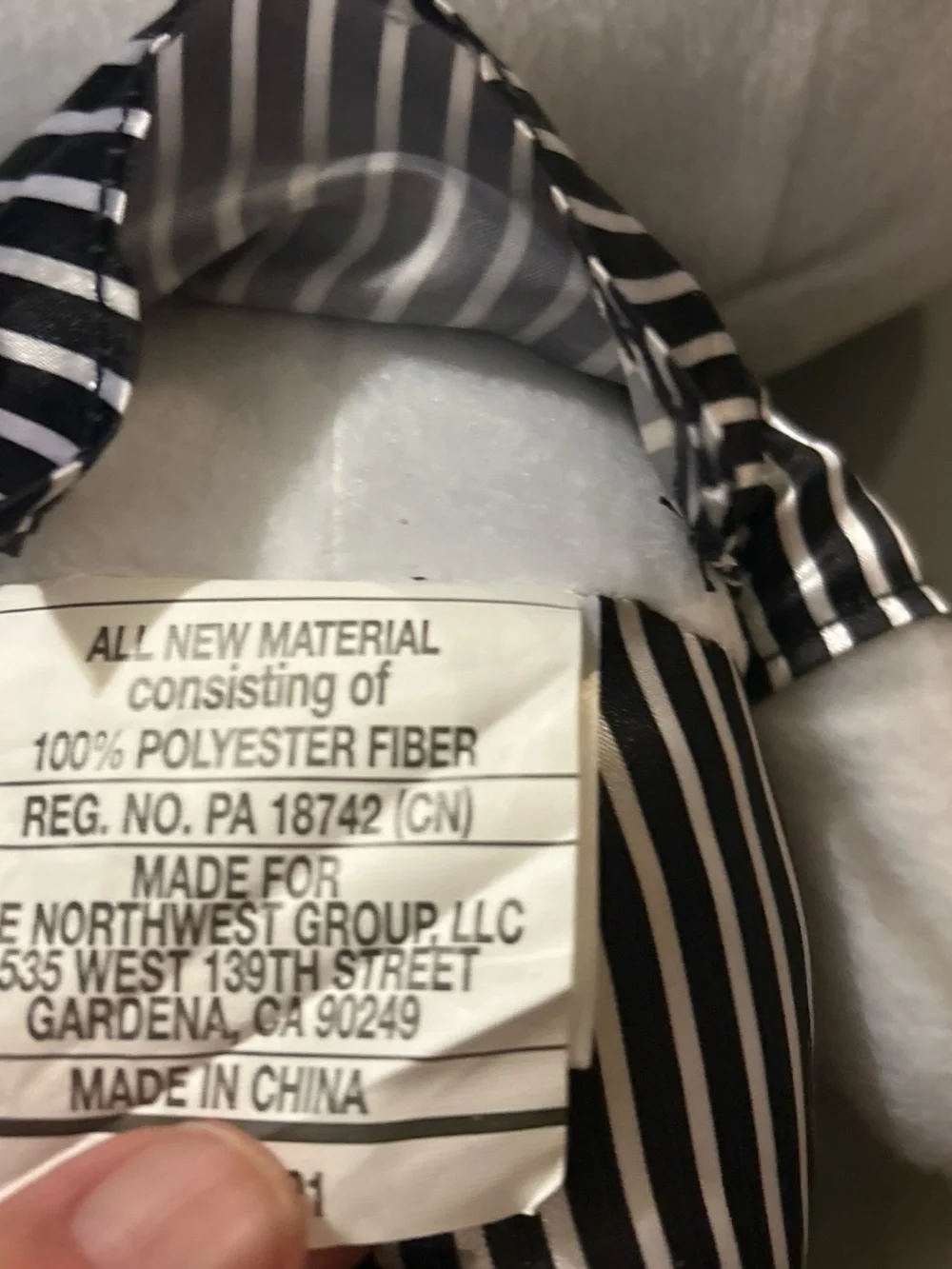 Plush Skeleton Character Toy in Black & White Striped Outfit